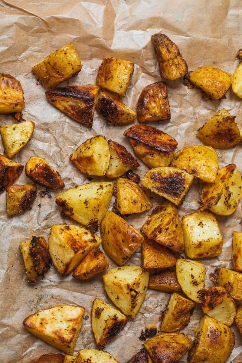 Vegan roast potatoes on a baking sheet