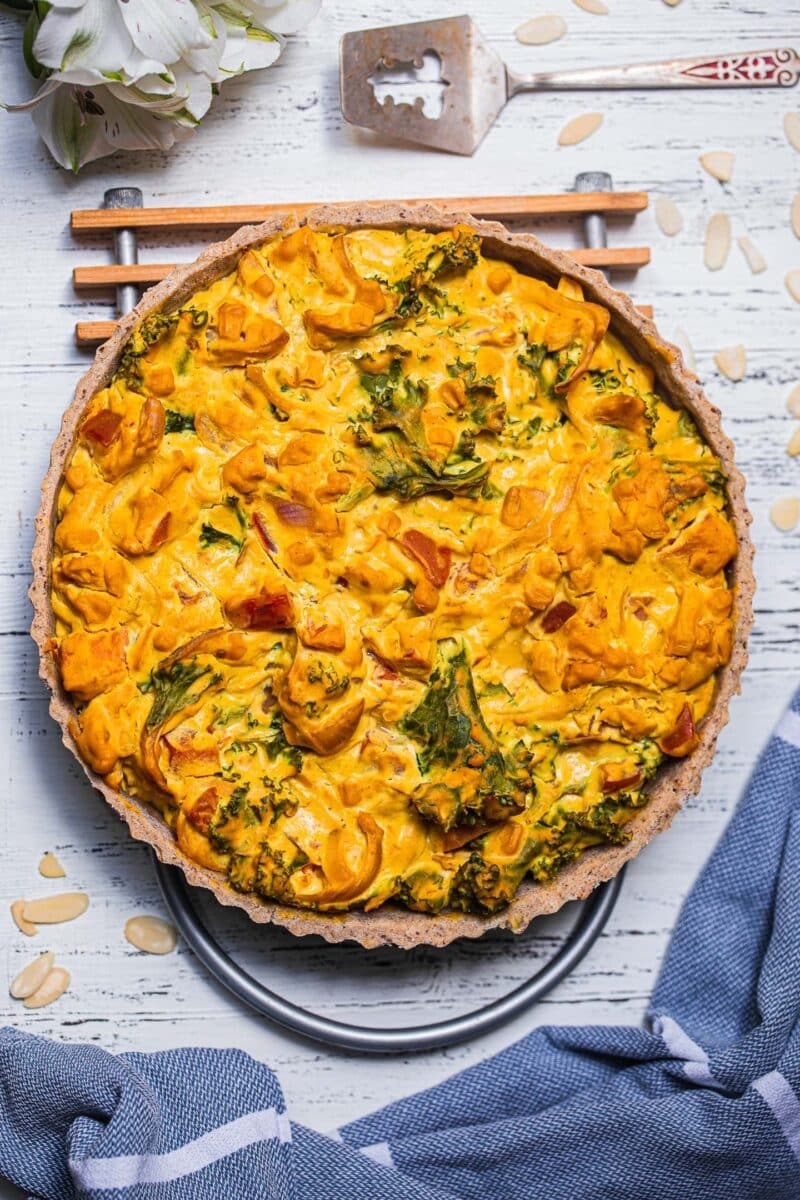Quiche with kale on a cooling rack
