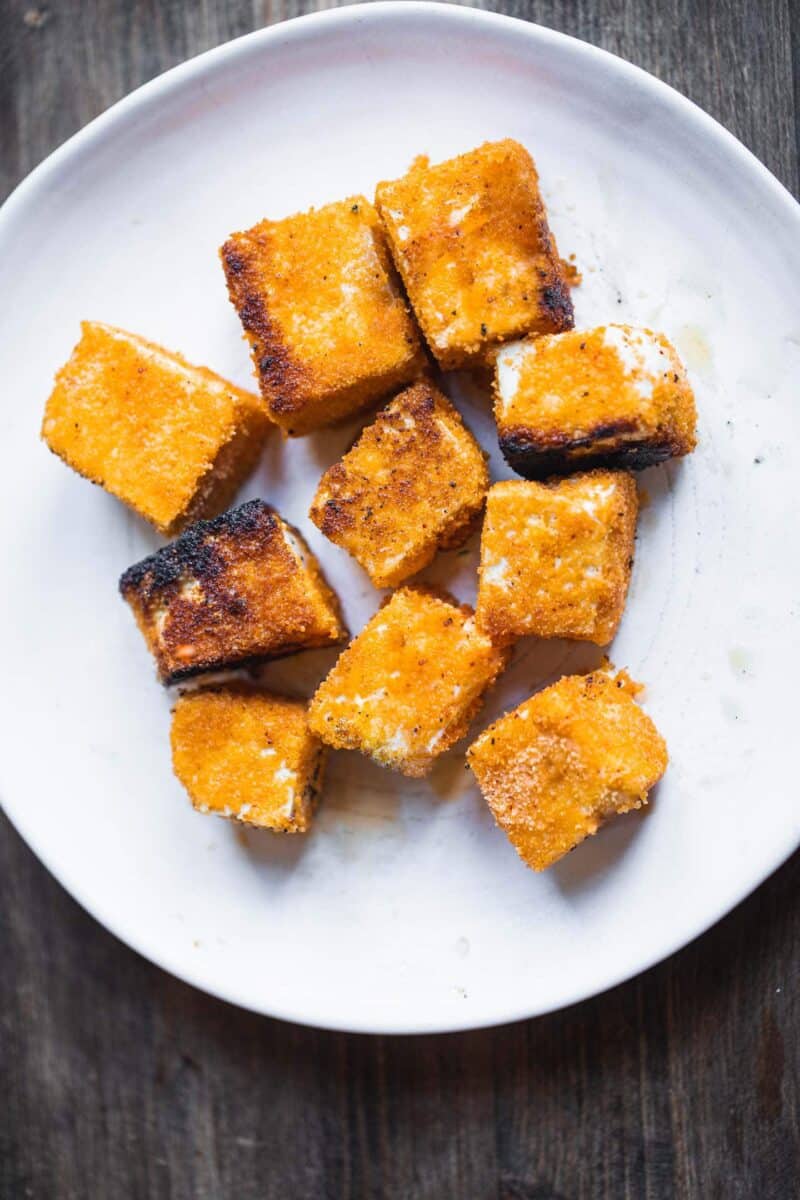 Fried tofu cubes on a plate