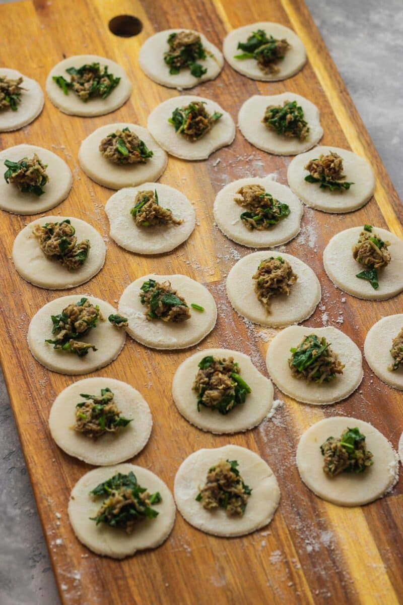Dumpling dough with mushroom and spinach filling