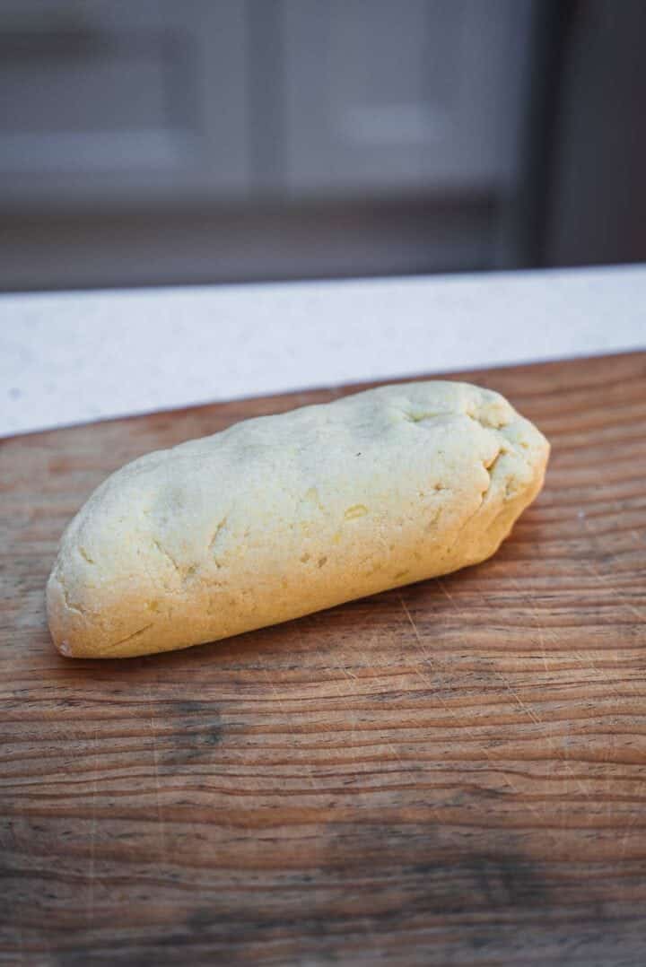 Gnocchi dough on a wooden board