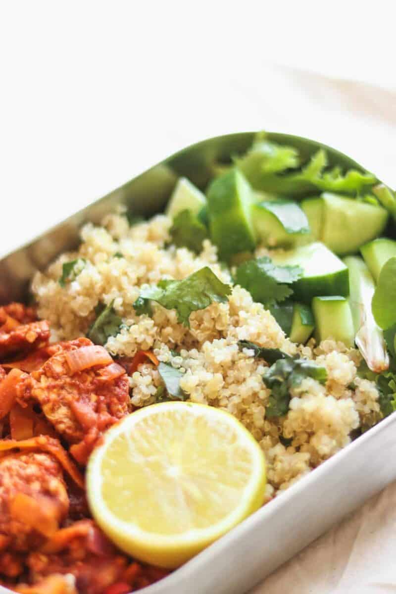 Quinoa and tempeh with a tomato sauce vegan meal prep lunch 