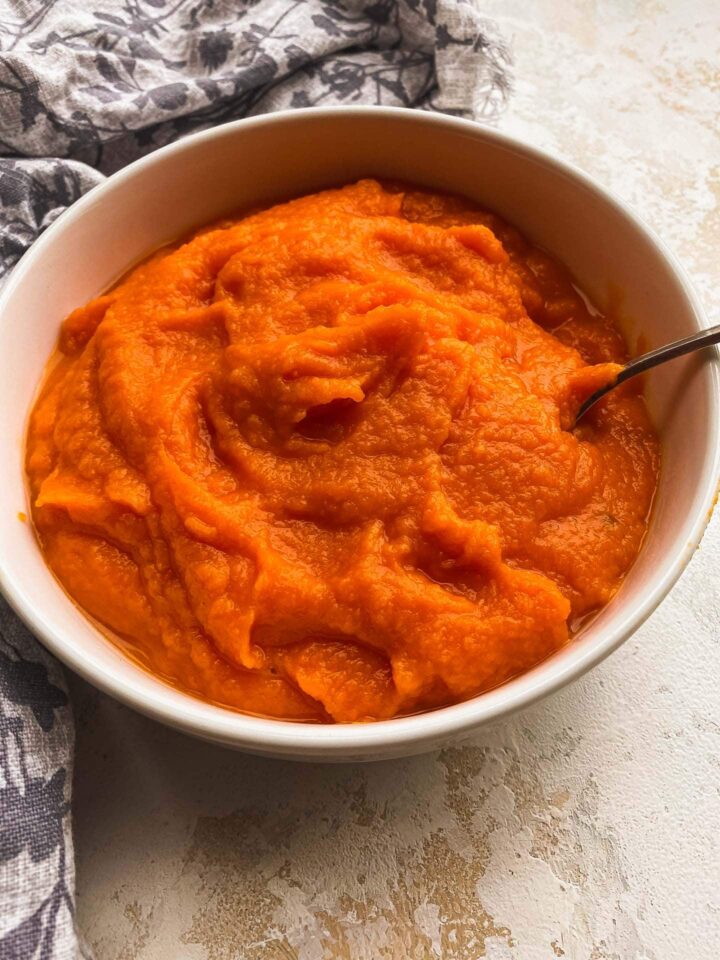 homemade pumpkin puree in a white bowl