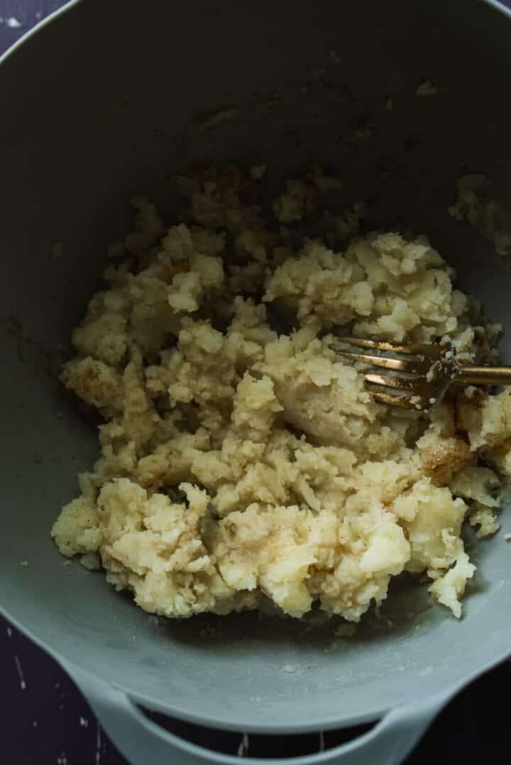 Mashed potatoes in a mixing bowl