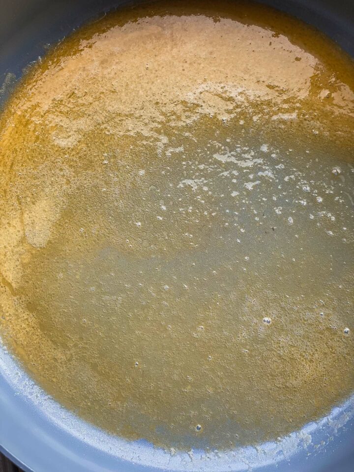 Melted vegan butter in a frying pan
