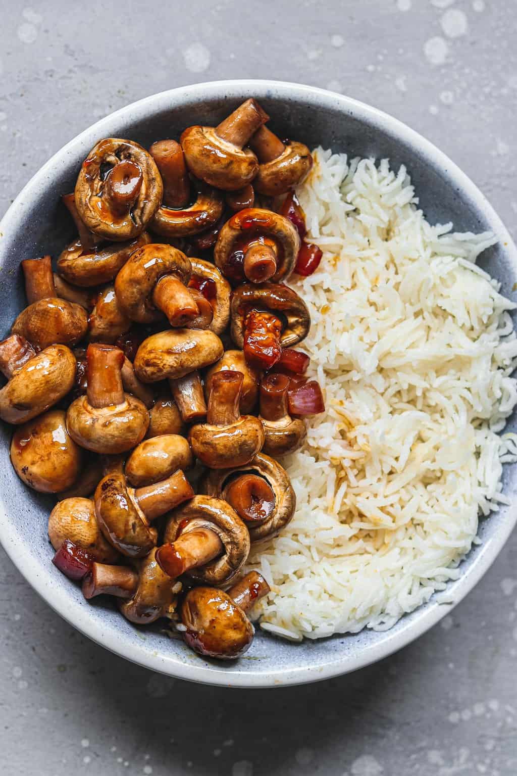 Mushrooms and rice in a blue bowl