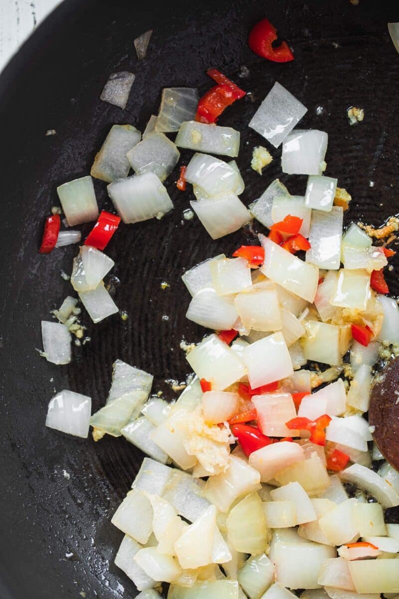 Onions and chilli in a frying pan