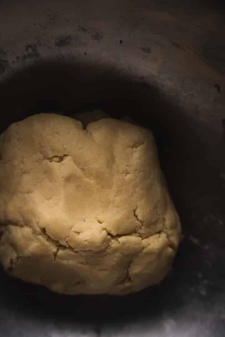 Pie crust dough in a mixing bowl