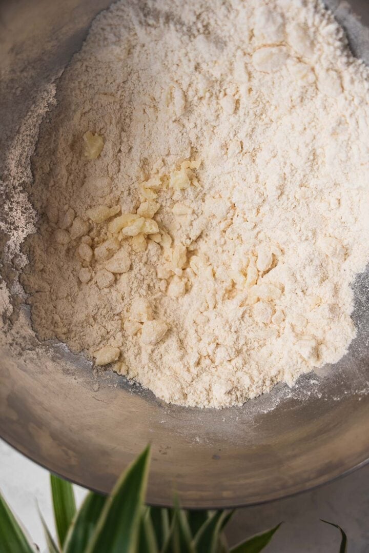Pie crust ingredients in a mixing bowl