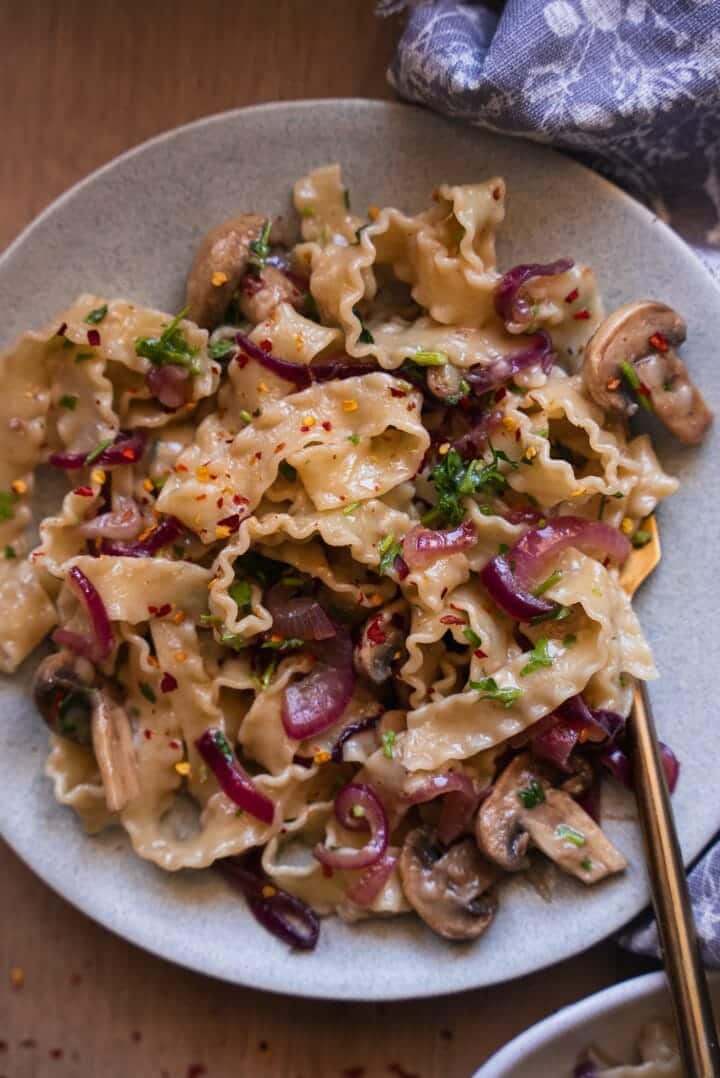 Plate of pasta with caramelised onion