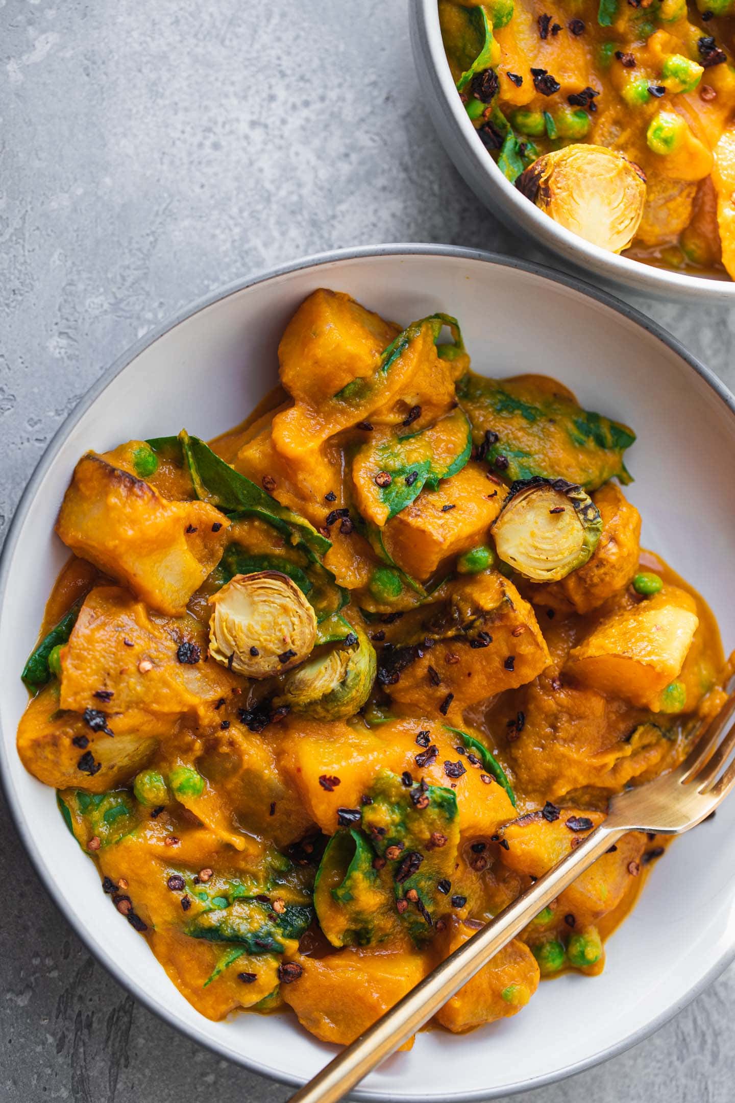 Potatoes and Brussels sprouts with a butternut squash sauce