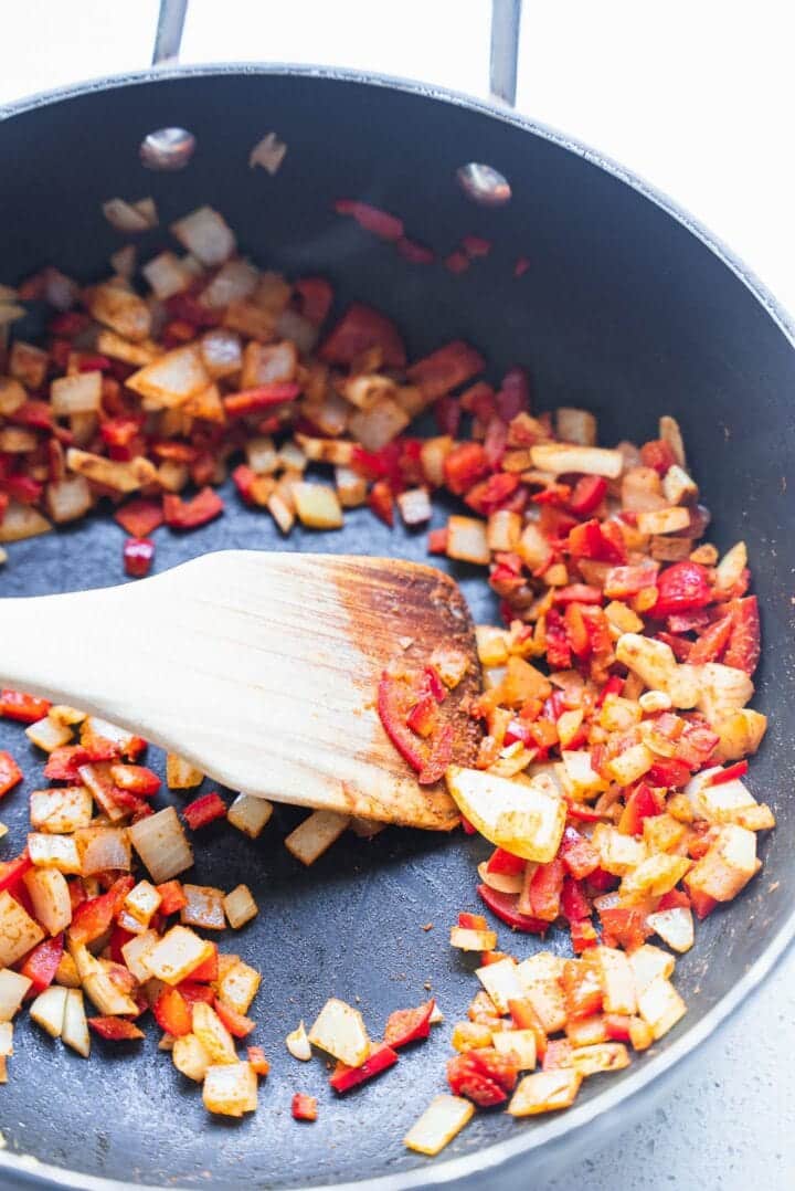 Red pepper and onion in a saucepan