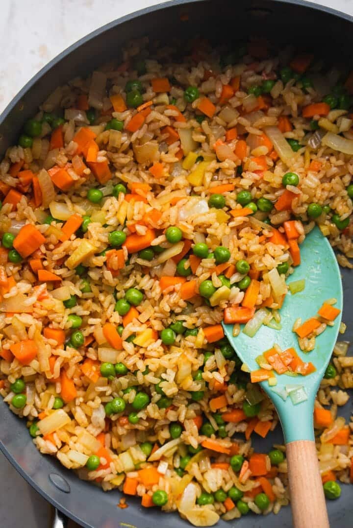 Rice and vegetables in a frying pan