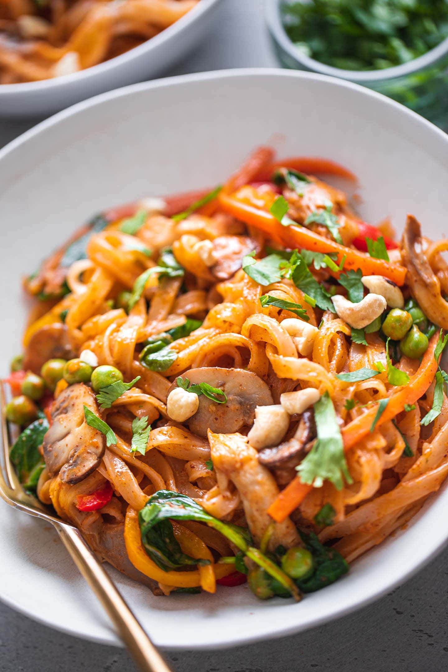 Rice noodle stir-fry with vegetables and peas