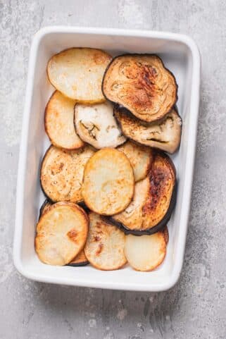 Roasted potatoes and eggplant in a baking dish