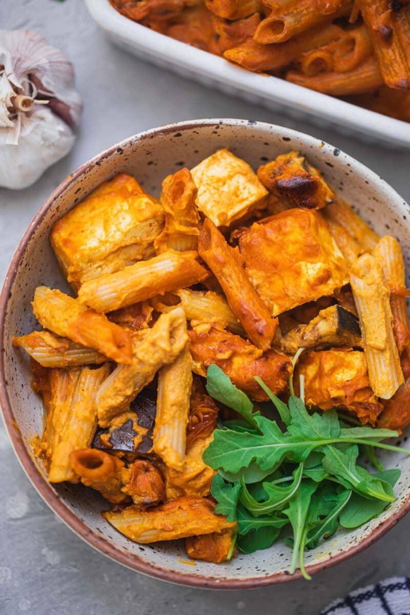 Pasta bake with tofu and aubergine in a bowl