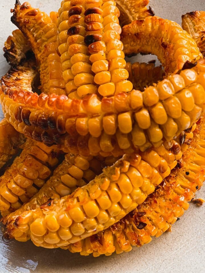 Spicy baked corn on a plate