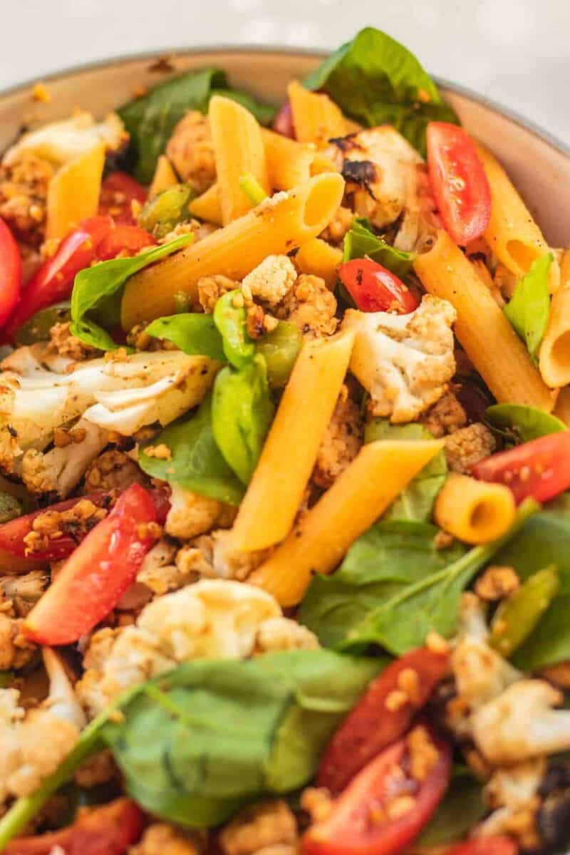 Tempeh pasta with roasted cauliflower in a bowl