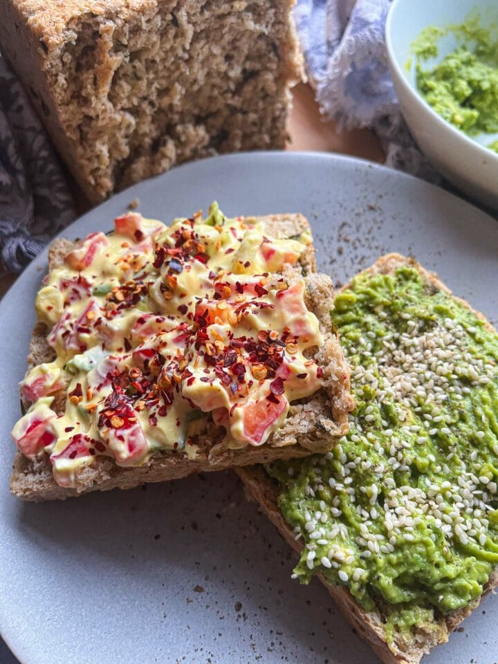 Toast with cream cheese and avocado toppings