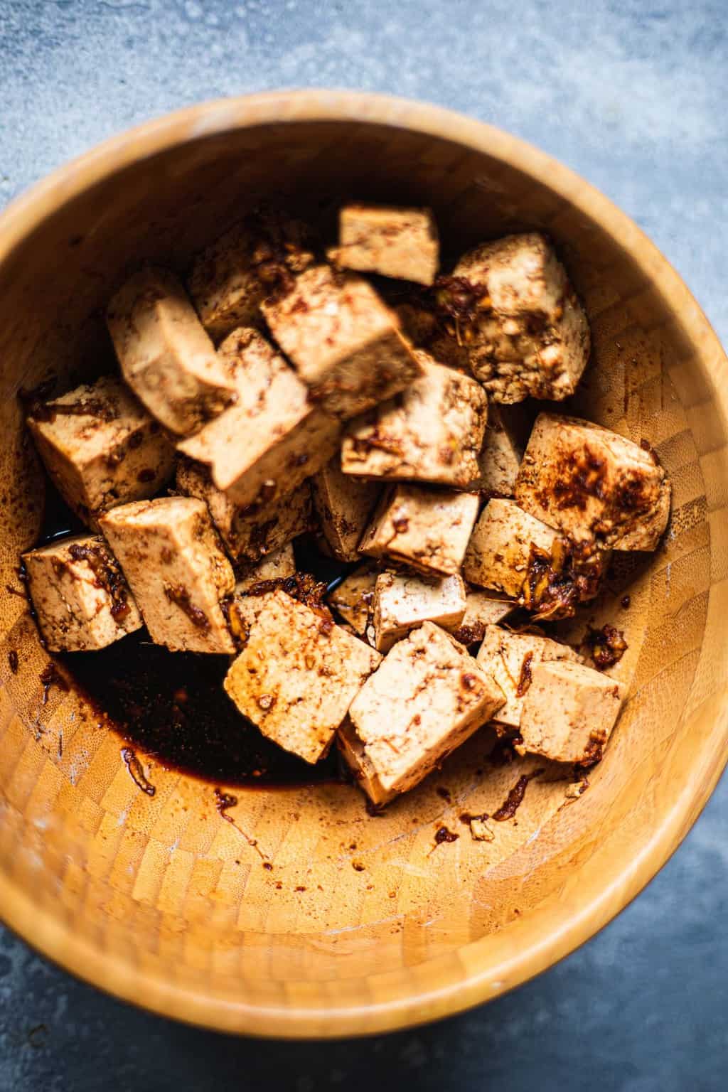 Bowl with tofu in a marinade