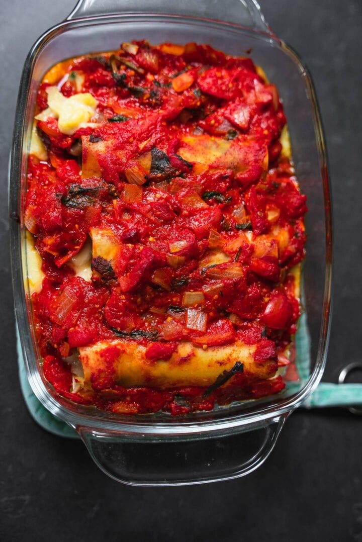 Tomato sauce cannelloni in a baking dish