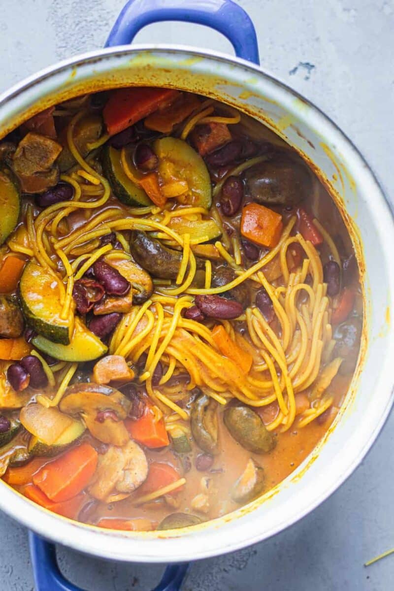Spaghetti with vegetables in a saucepan