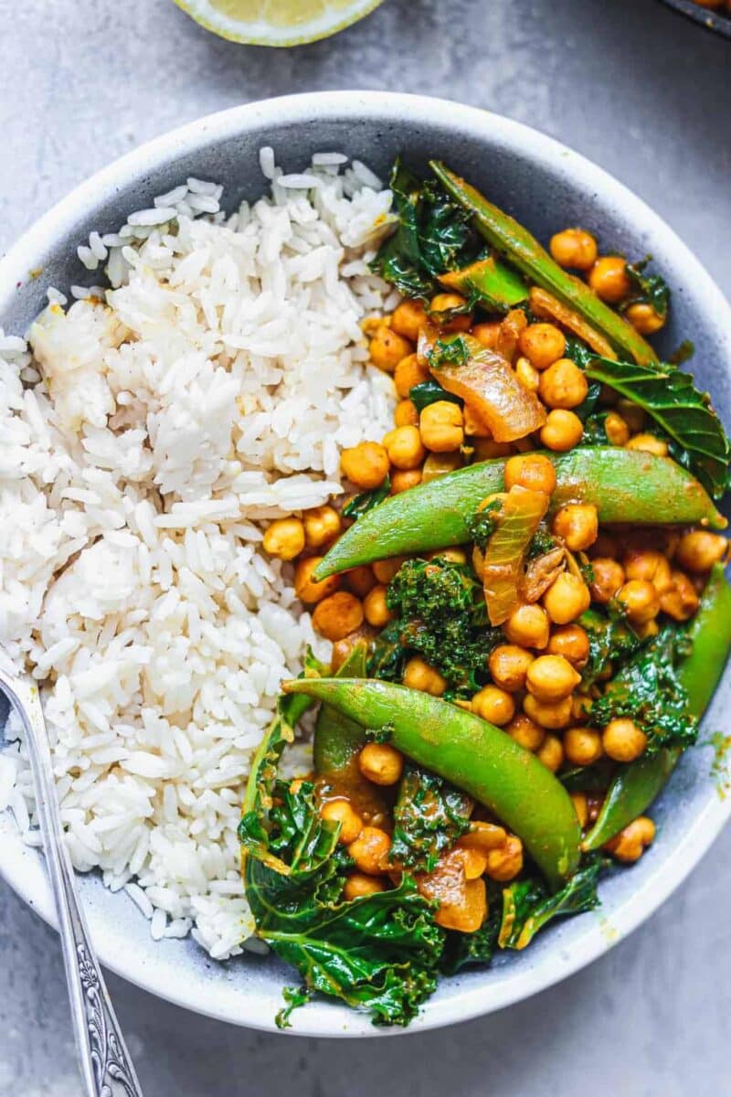 Closeup of vegan curry with chickpeas in a blue bowl