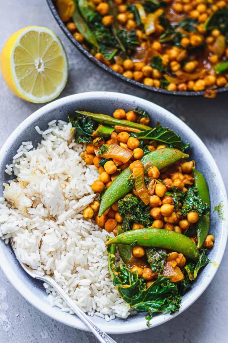 Blue bowl with vegan curry and white rice