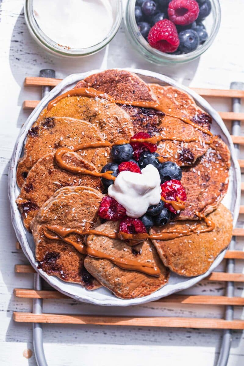 Vegan pancakes with chocolate chips and berries