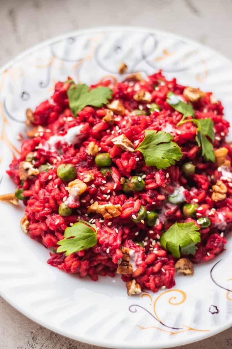 Beetroot risotto with walnuts and peas