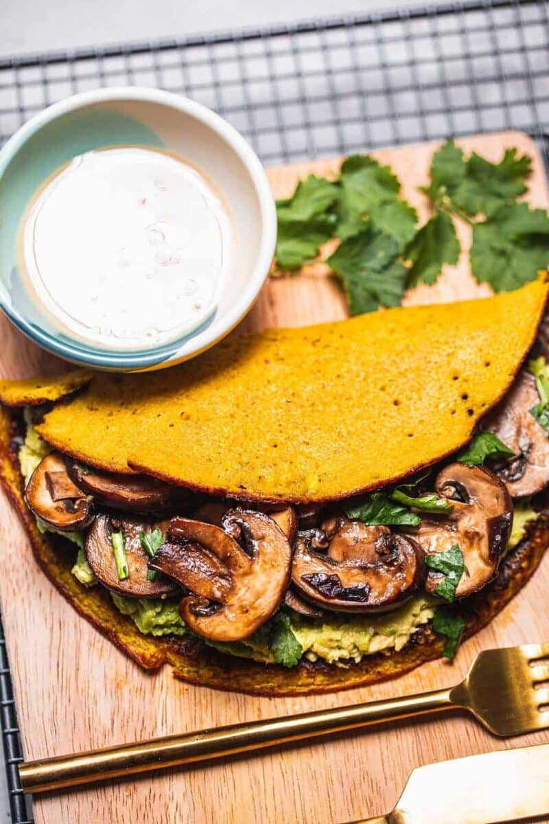 Chickpea omelette with mushrooms and avocado
