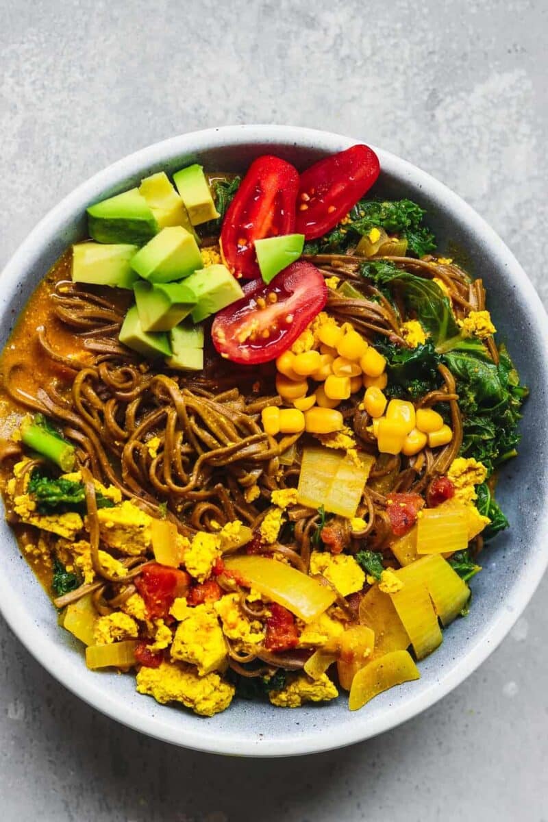 Blue bowl with noodles tofu and vegetable