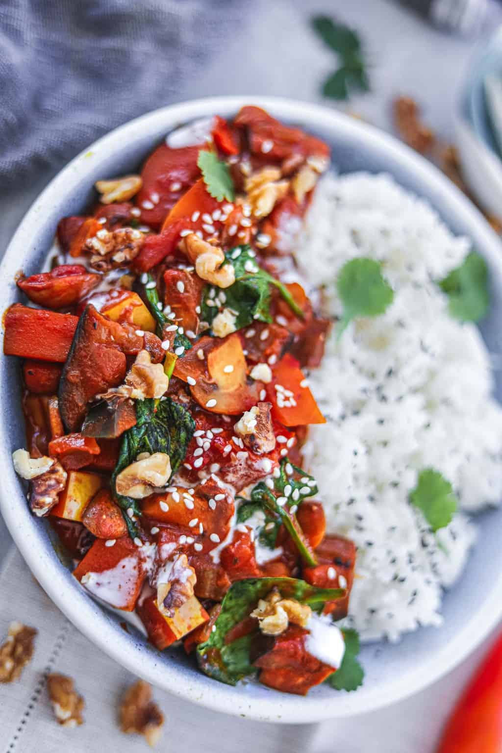 Bowl of vegan eggplant curry over rice
