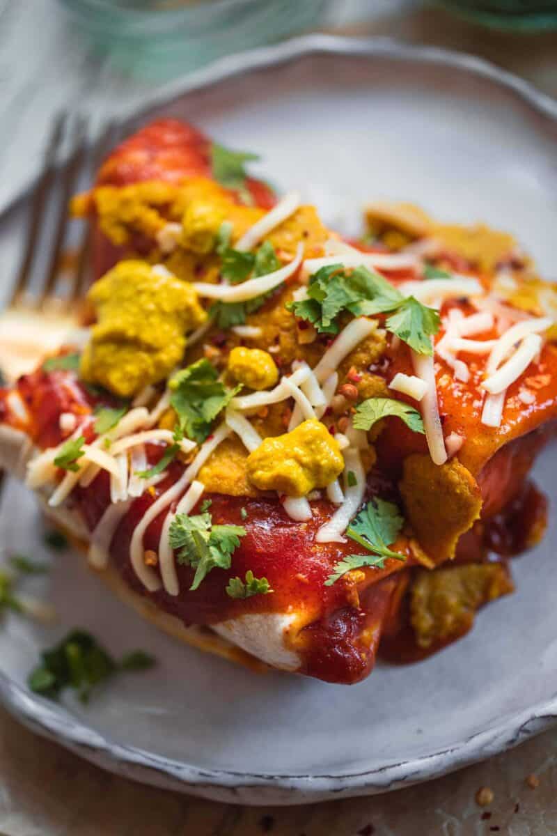 Vegan enchiladas with cashew cheese and fresh herbs