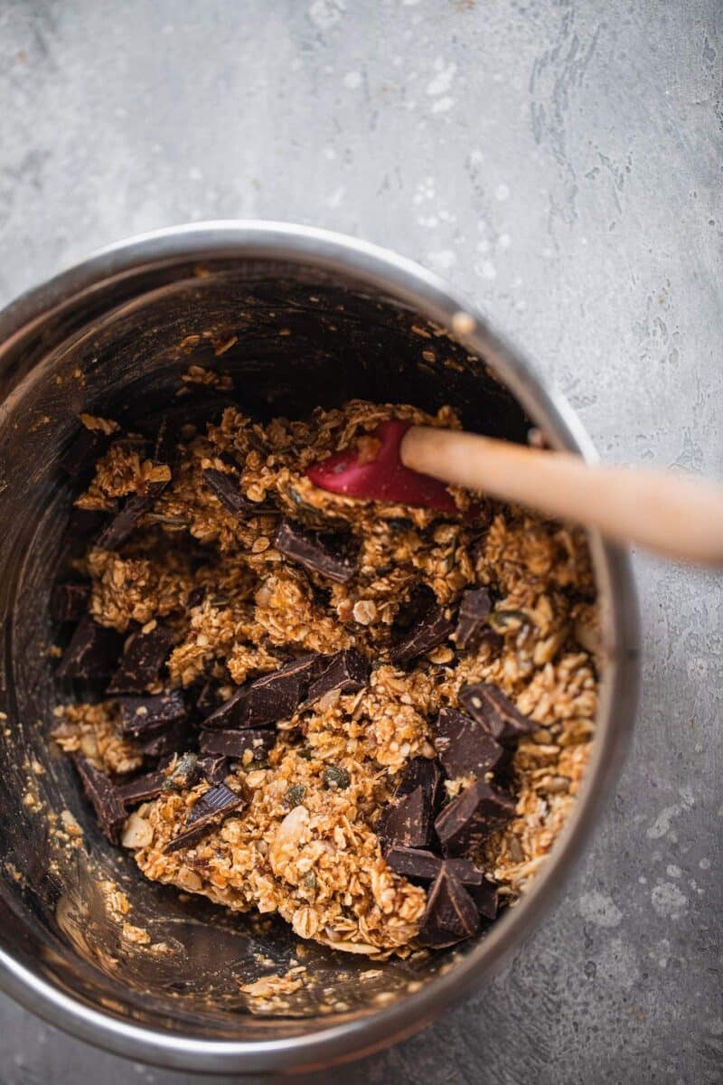 Vegan granola mixture with chocolate in a bowl