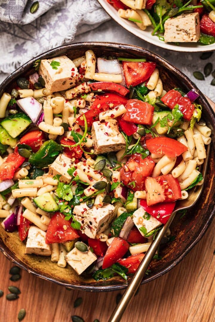 Vegan macaroni salad in a large serving bowl