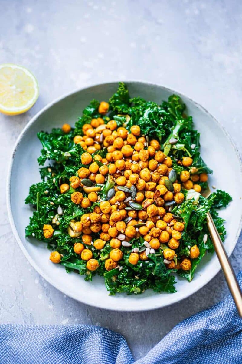 Kale and chickpeas in a white bowl