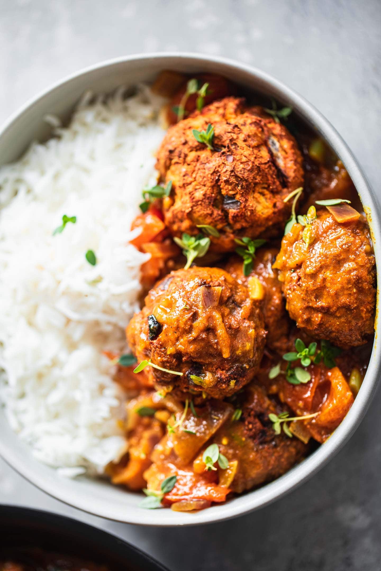 Vegan meatballs with curry sauce and rice