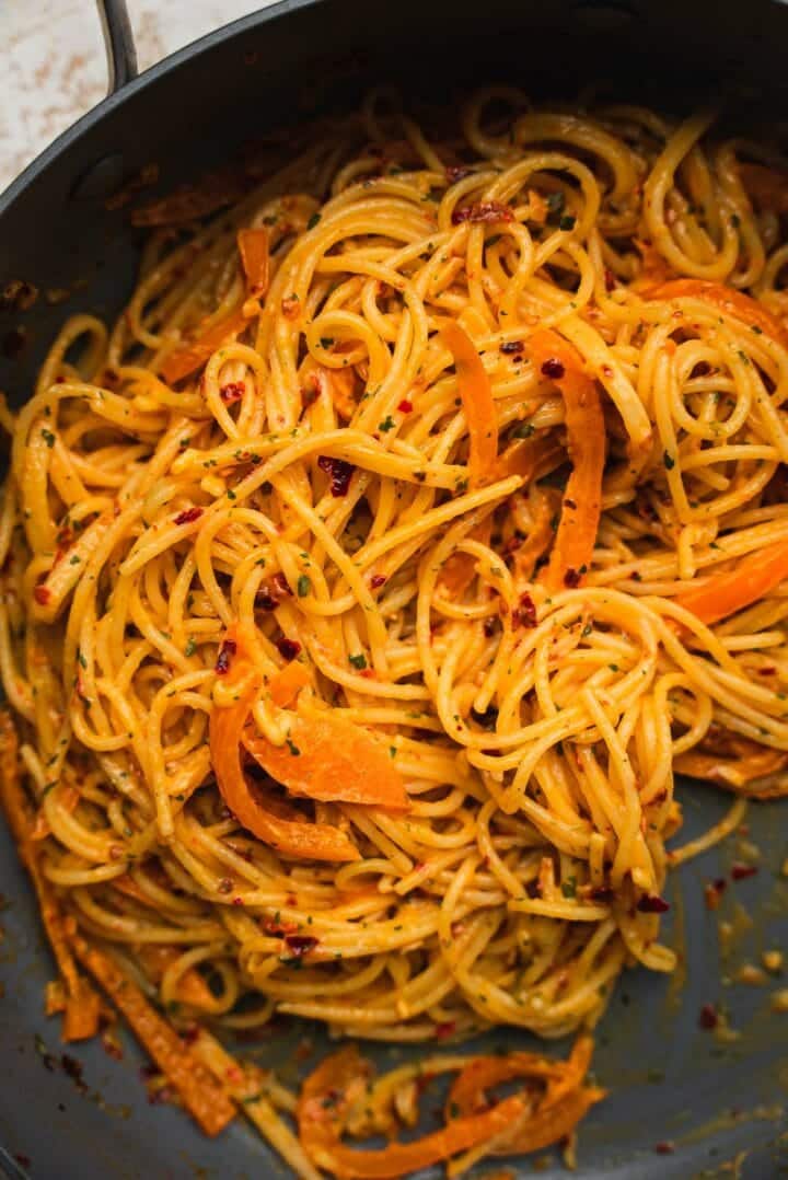 Vegan spicy spaghetti in a frying pan