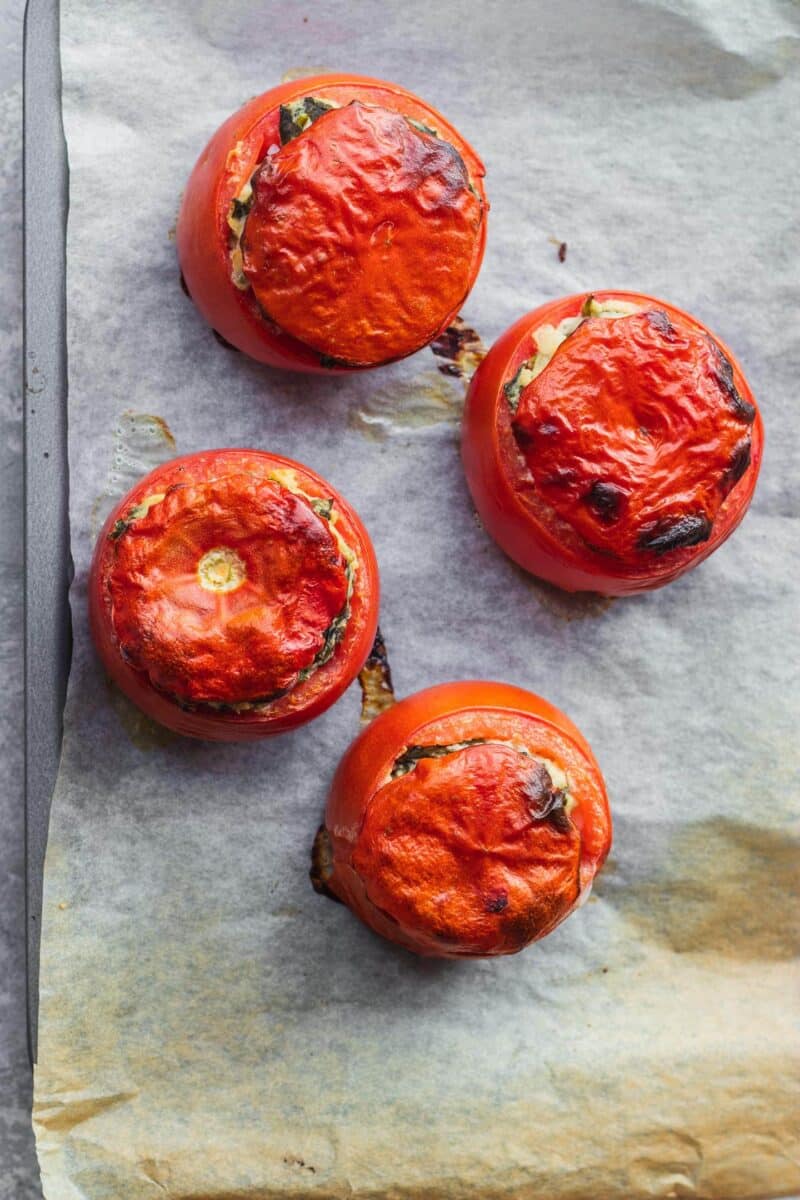 Vegan stuffed tomatoes with rice and creamed spinach