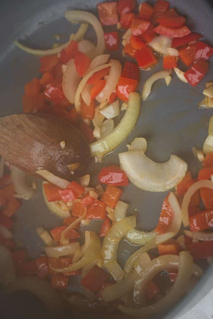 Vegetables and mushrooms in a frying pan