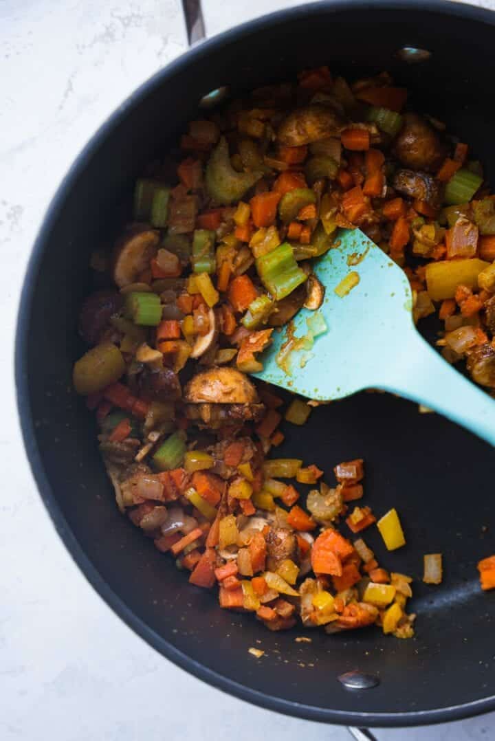 Vegetables and spices in a saucepan
