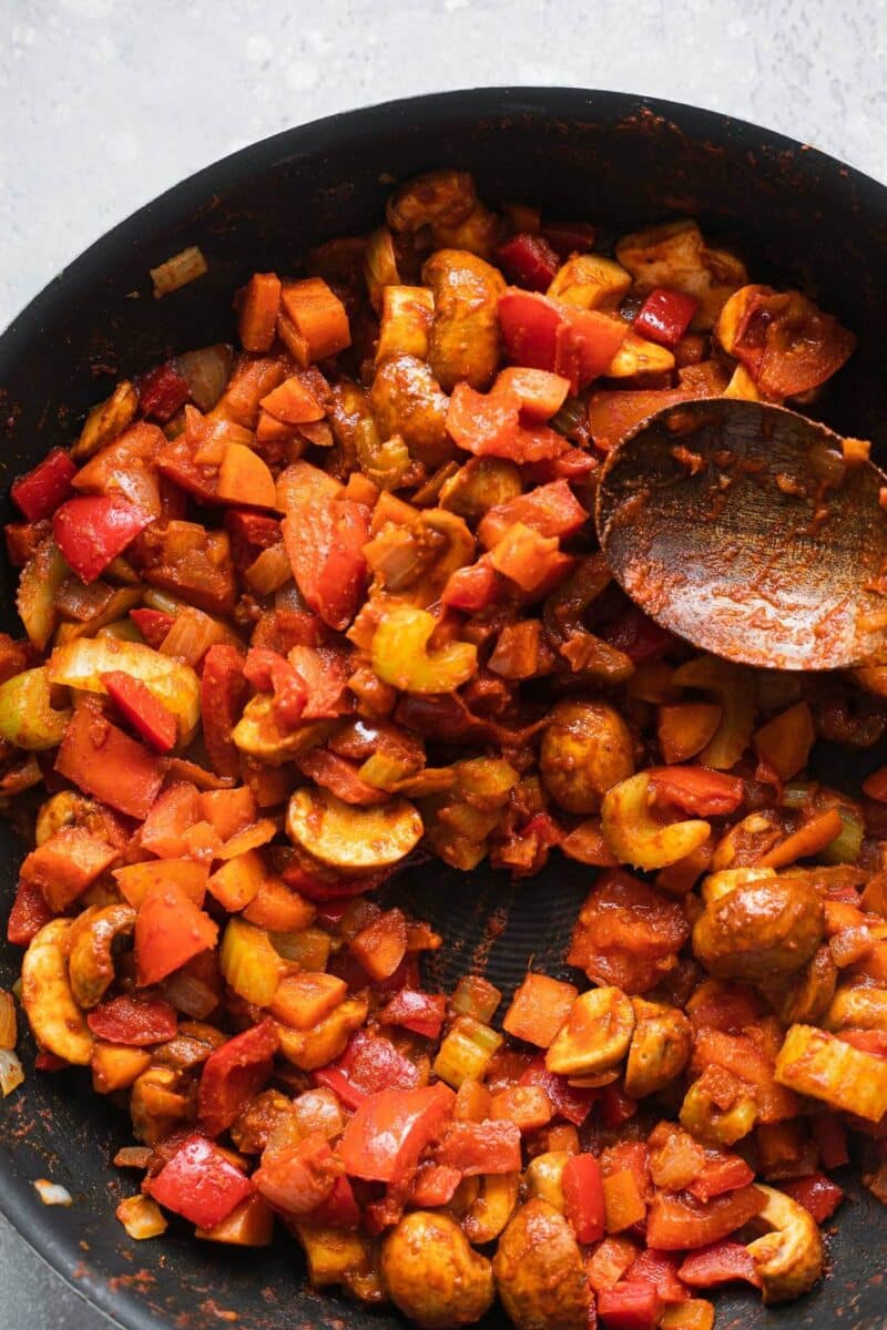 Vegetables in a tomato sauce in a frying pan