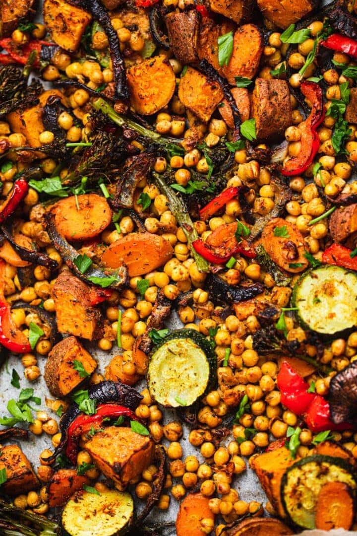 Vegetables, sweet potatoes and chickpeas on a baking tray