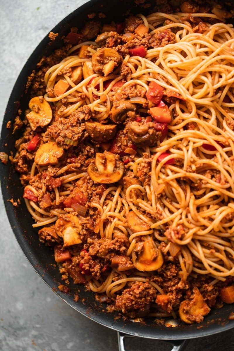 Vegetarian Bolognese with spaghetti in a large pan