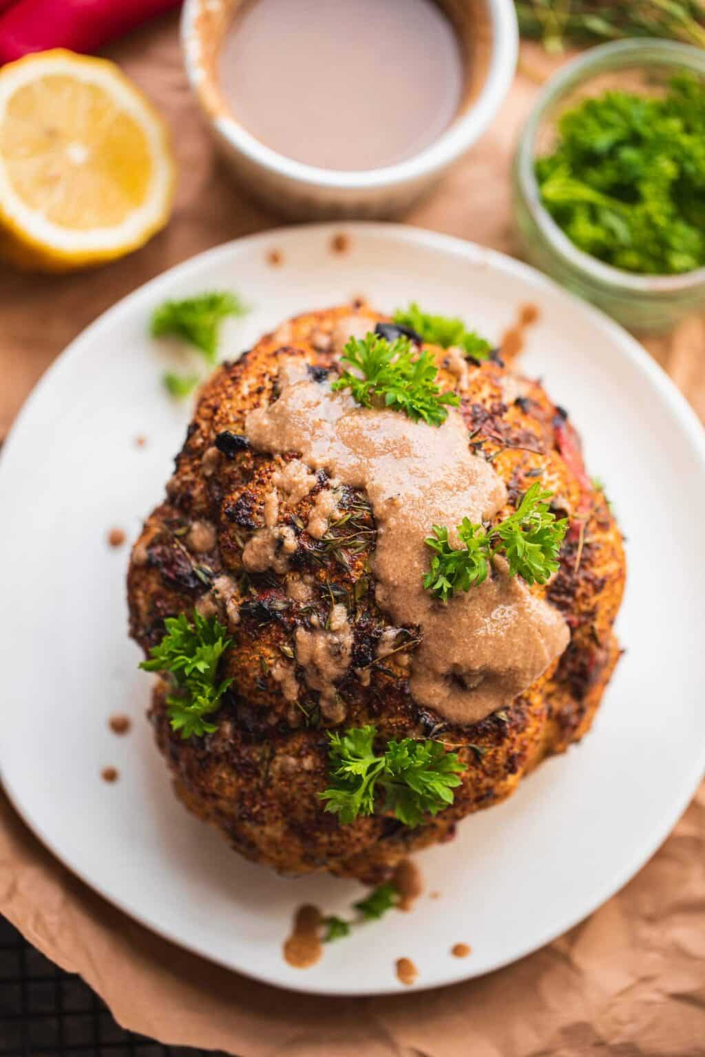 Whole Roasted Cauliflower With Tahini Sauce - Oh My Veggies