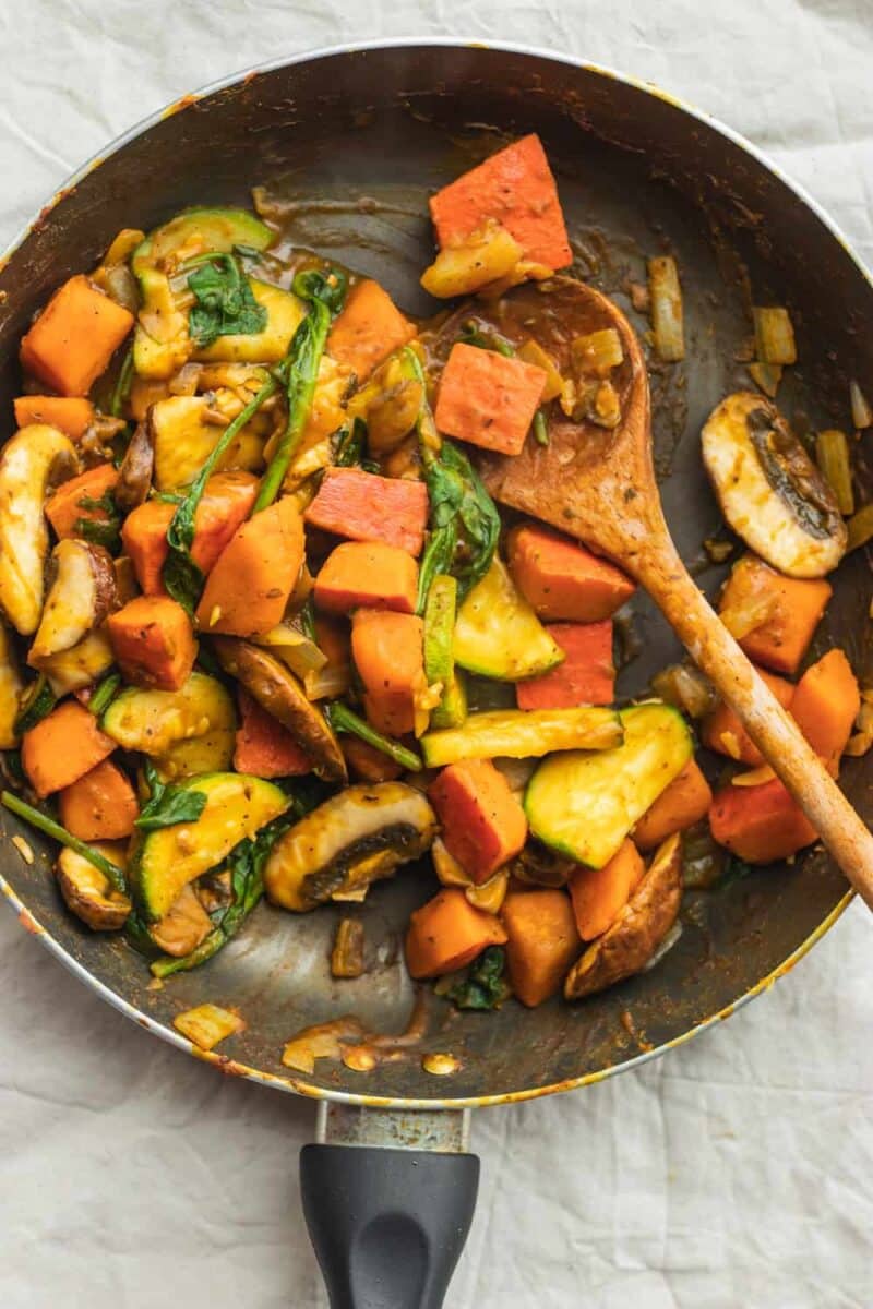 Easy vegan stir-fry with pumpkin and autumn vegetables in a frying pan