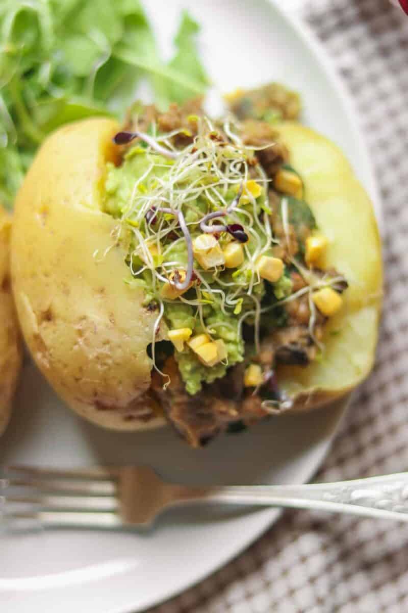 Vegan simple jacket potatoes with a one-pot lentil filling and avocado