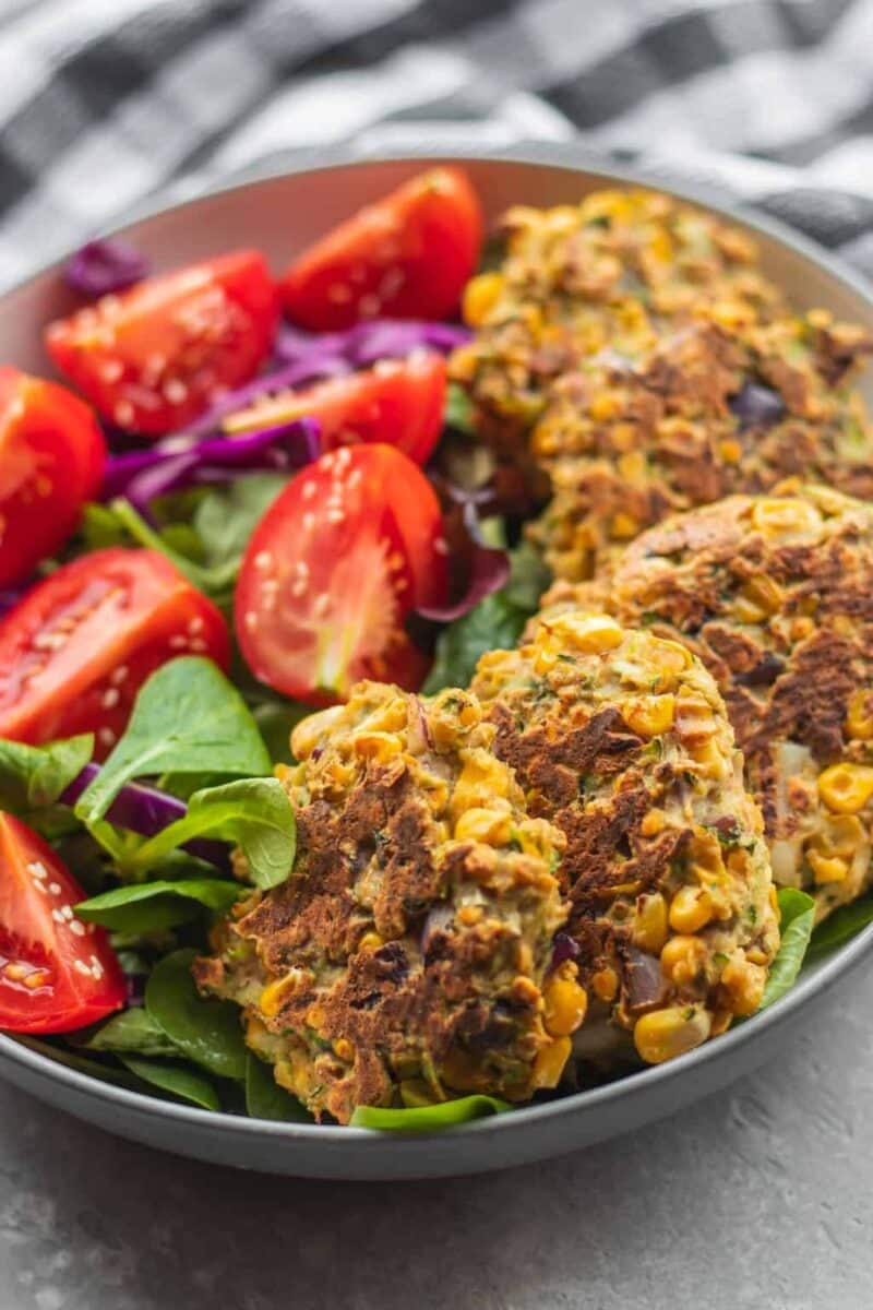 Vegan red lentil zucchini fritters with salad