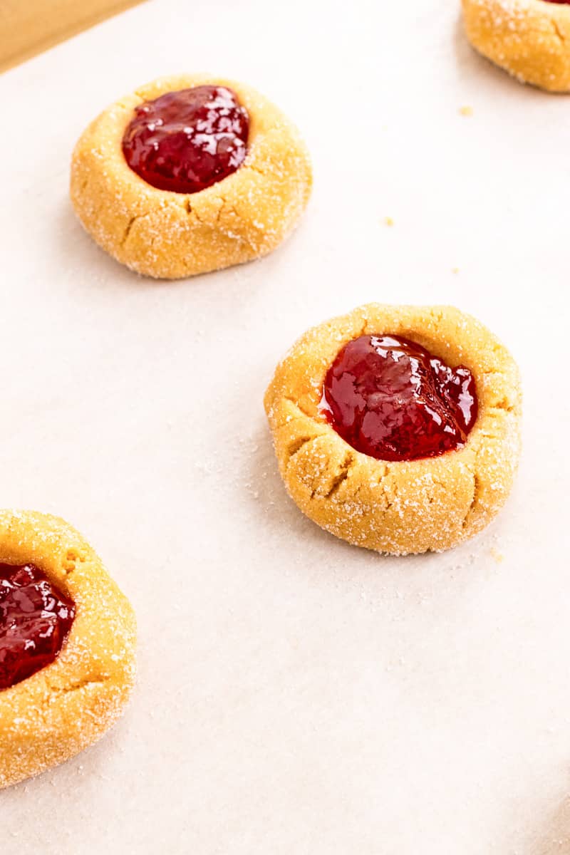 peanut butter and jelly cookie dough balls with jam in indents